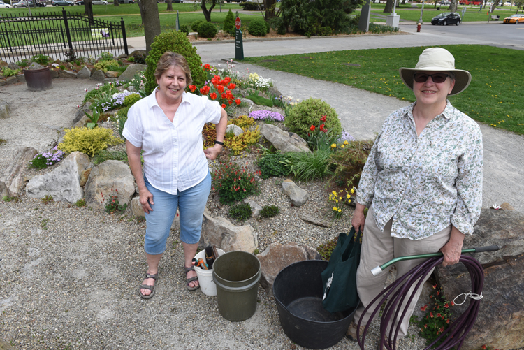 Sandra Ciccone and Lyn Lang from the Allegheny Chapter of the North American Rock Garden Society are at the group's garden to do some work.